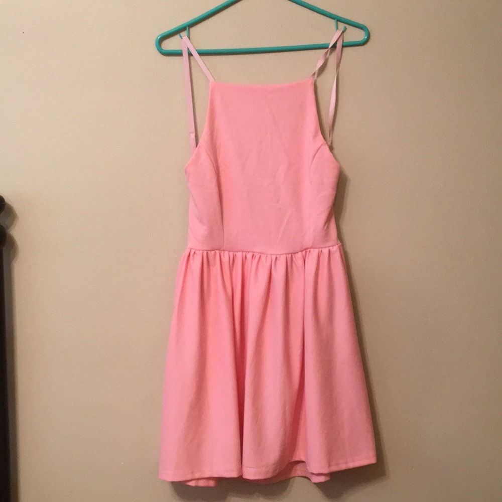 Backless dress. Never worn with tags